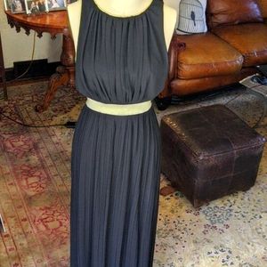 Elegant floor length pleated dress with gold trim